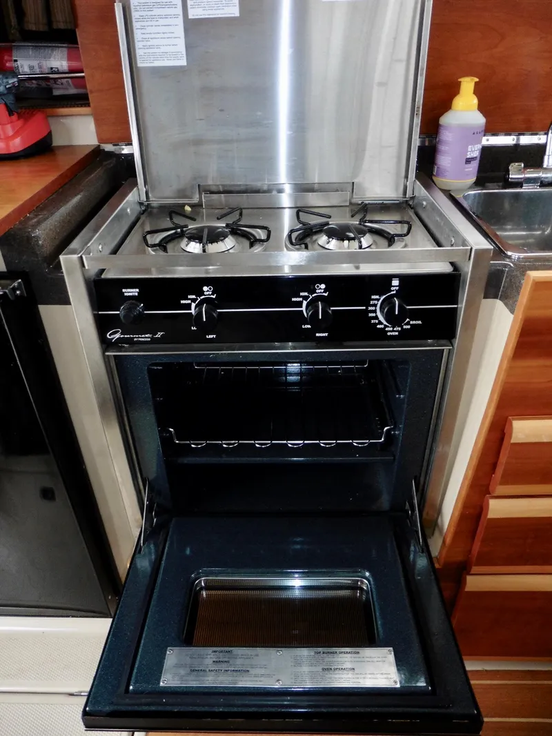Slide: The Image of Stainless steel boat stove and oven in 2015 Cutwater 30CB galley. - 46