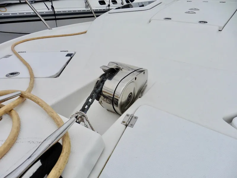 Slide: The Image of 2015 Cutwater 30CB boat deck with anchor winch and rope. - 5
