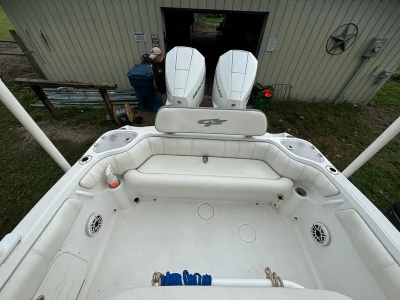 Slide: The Image of 2021 Glasstream 280 SCX boat interior with twin engines and spacious seating. - 23