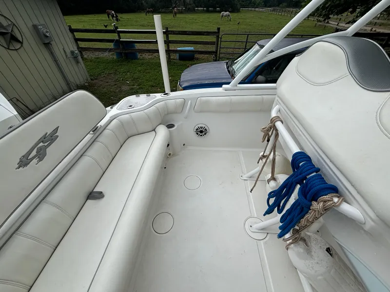 Slide: The Image of 2021 Glasstream 280 SCX boat interior with white seating and blue ropes. - 25