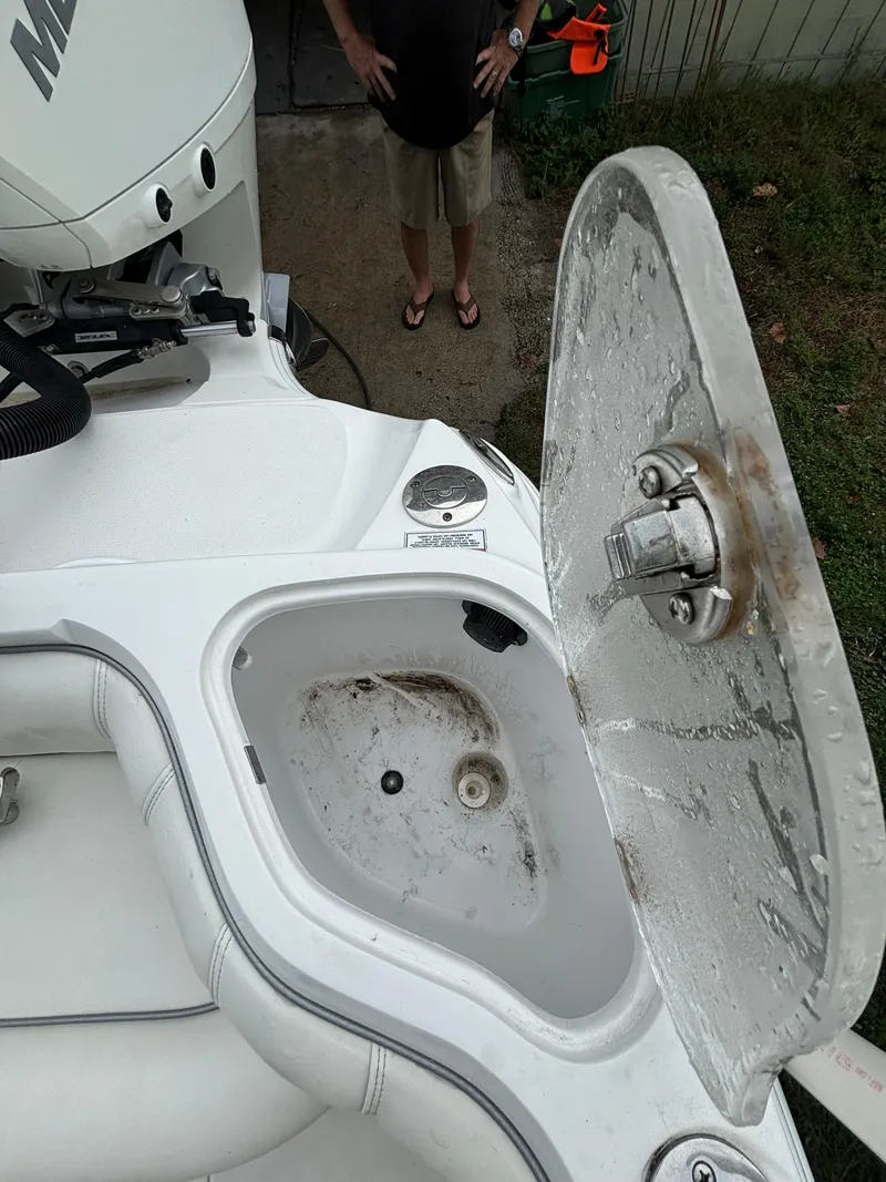 Slide: The Image of 2021 Glasstream 280 SCX boat with open storage compartment, showing interior details. - 29