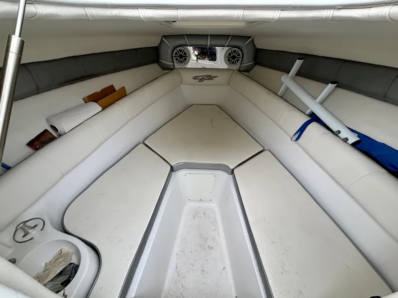 Slide: The Image of 2021 Glasstream 280 SCX boat interior with white seating and storage compartments. - 31