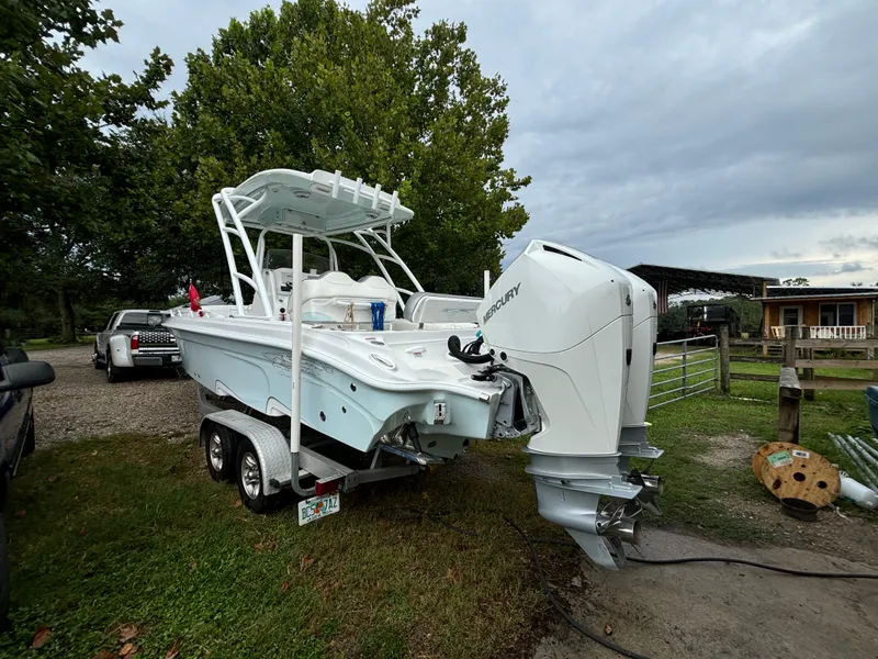 Slide: The Image of 2021 Glasstream 280 SCX boat on trailer with Mercury outboard motor. - 6
