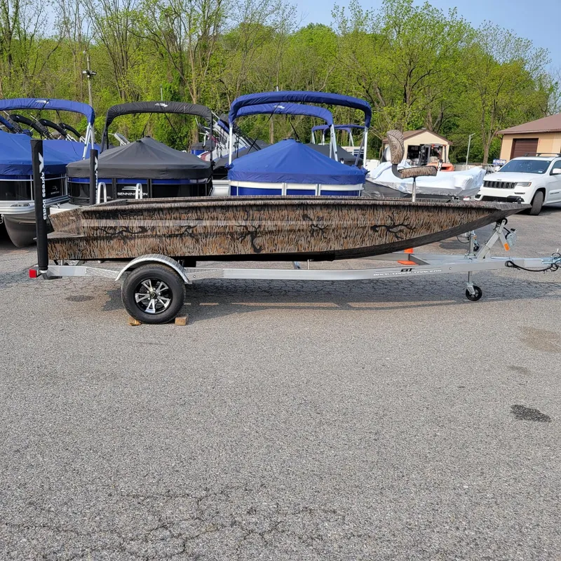 The Image of 2025 Xpress H18DB Duck boat with Yamaha 50 hp engine on trailer, in stock. - 1
