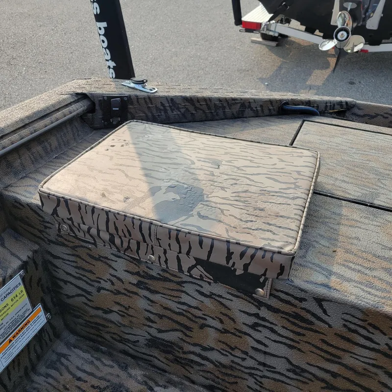 Slide: The Image of 2025 Xpress H18DB Duck boat with camo seating, featuring Yamaha 50 hp engine. - 10