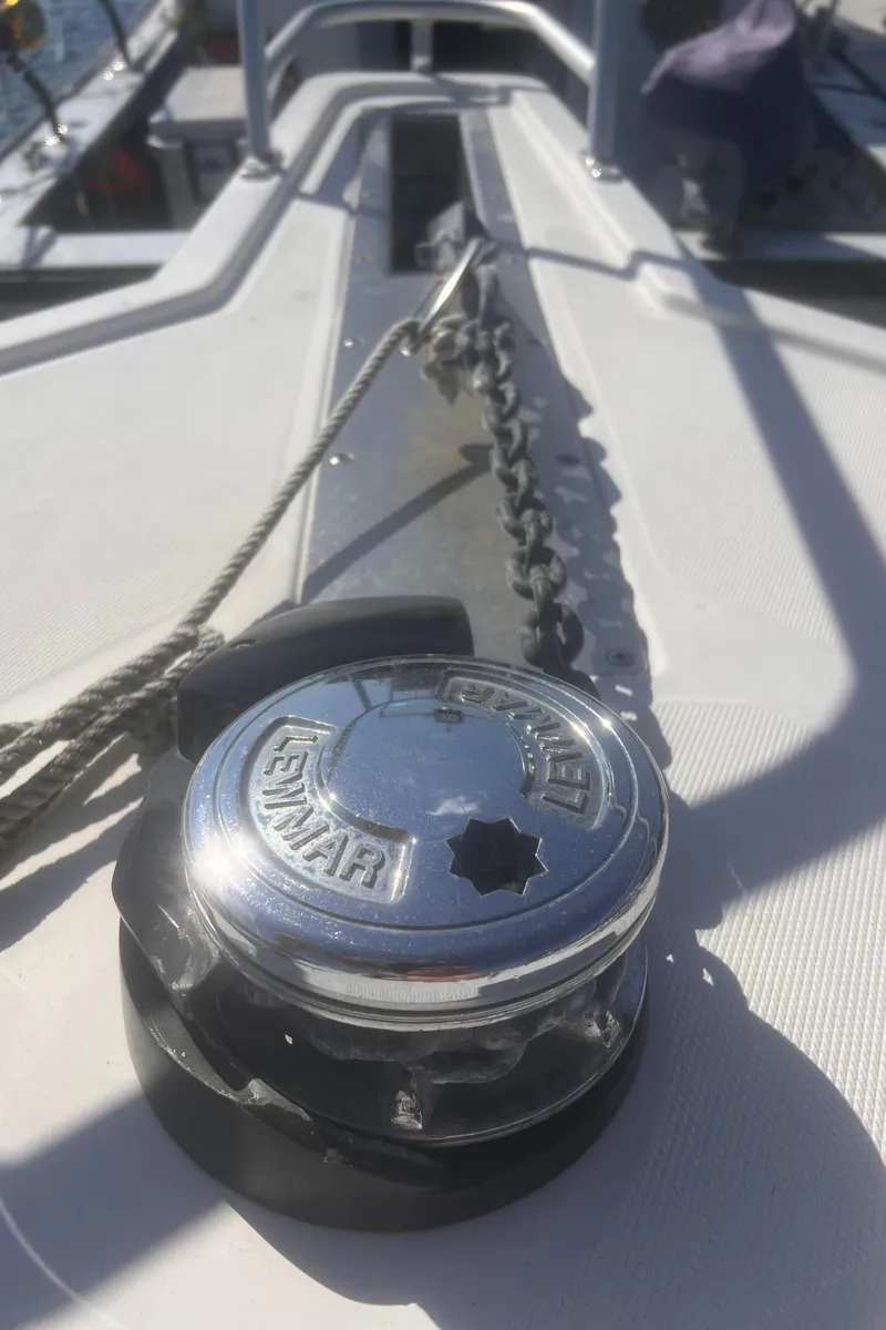 Slide: The Image of Close-up of a 2003 Cabo Express boat's anchor windlass on deck. - 35