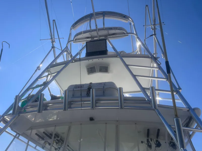 Slide: The Image of 2003 Cabo Express boat tower against a clear blue sky. - 6