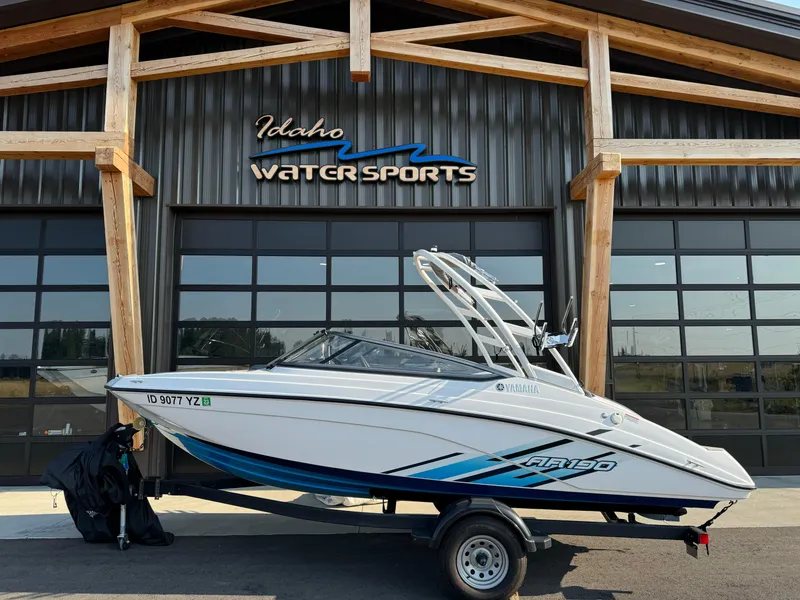 Slide: The Image of 2021 Yamaha AR190 boat on trailer at Idaho Water Sports facility. - 2