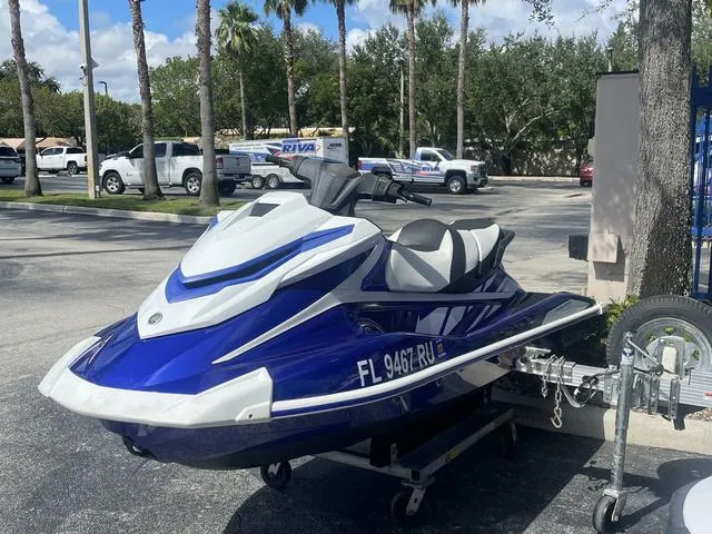 Slide: The Image of 2018 Yamaha WaveRunner GP1800 jet ski on trailer in parking lot. - 3