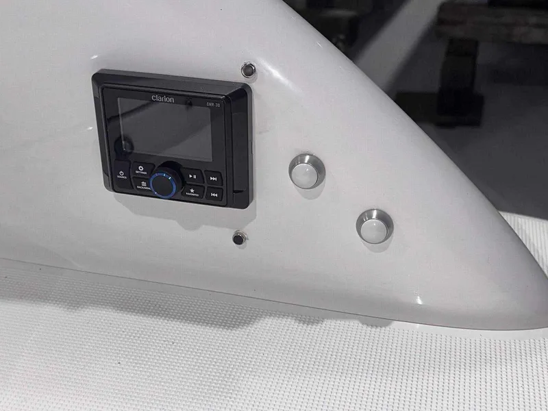 Slide: The Image of 2024 Formula 270 Bowrider dashboard with Clarion audio system. - 10