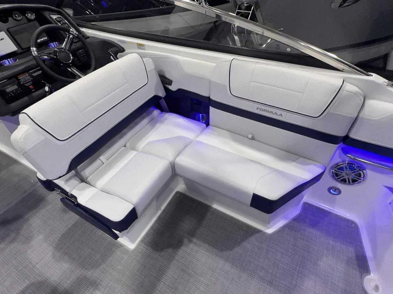 Slide: The Image of 2024 Formula 270 Bowrider interior with white seating and modern dashboard. - 17