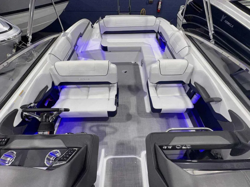 Slide: The Image of 2024 Formula 270 Bowrider interior with modern seating and ambient lighting. - 27