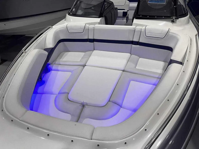 Slide: The Image of 2024 Formula 270 Bowrider boat interior with blue LED lighting. - 29