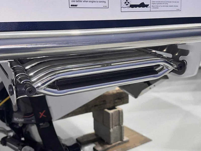 Slide: The Image of 2024 Formula 270 Bowrider swim ladder detail, showcasing stainless steel construction. - 3