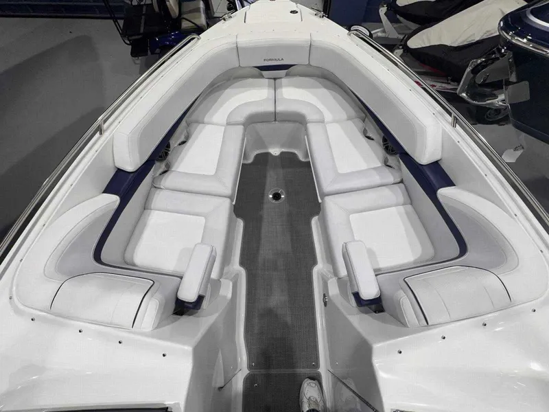 Slide: The Image of 2024 Formula 270 Bowrider with spacious white seating and sleek design. - 30
