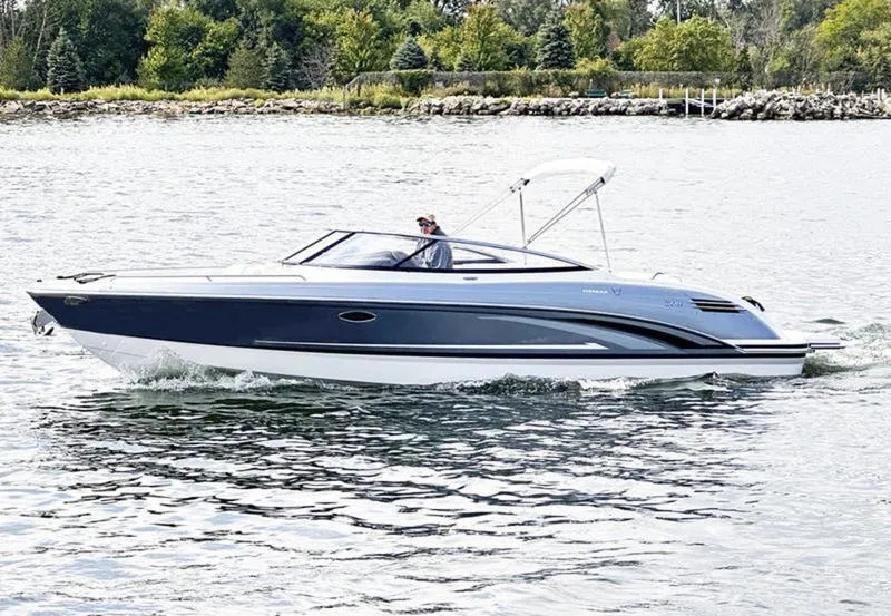 The Image of 2024 Formula 270 Bowrider cruising on a scenic lake. - 0