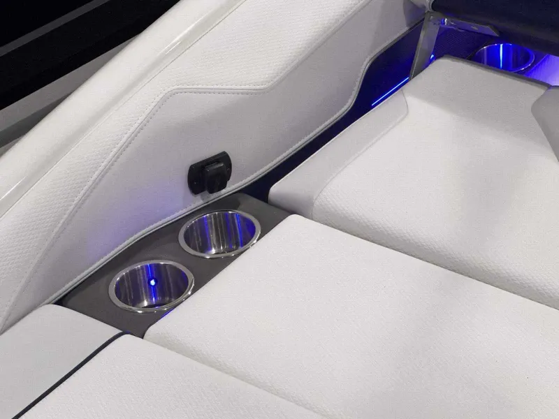 Slide: The Image of 2024 Formula 270 Bowrider interior with white seating and illuminated cup holders. - 11