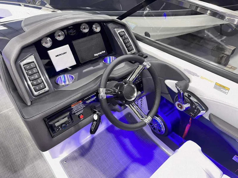 Slide: The Image of 2024 Formula 270 Bowrider dashboard with modern controls and illuminated interior. - 22