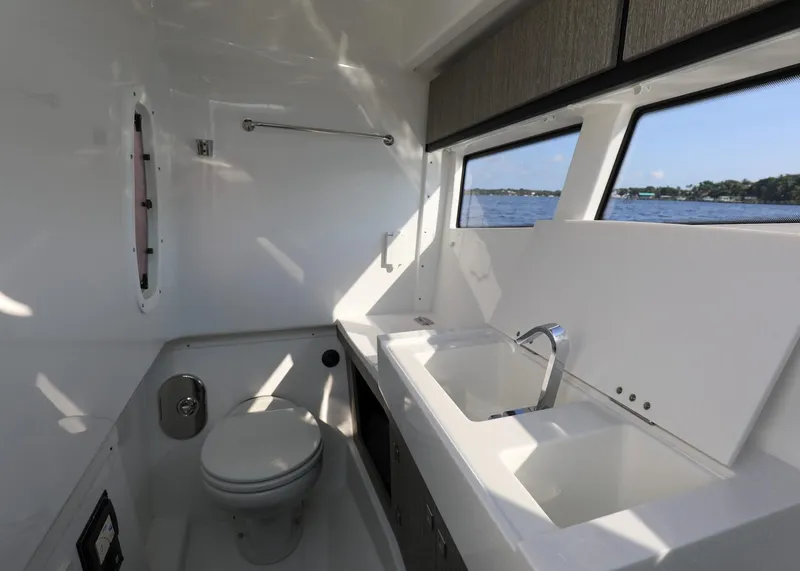 Slide: The Image of Luxurious bathroom interior of 2023 Monterey 385 Super Sport yacht with ocean view. - 29