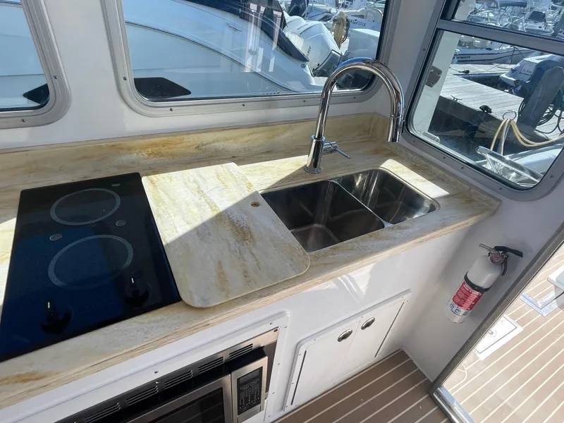 Slide: The Image of Double sink with corian counter tops - 35