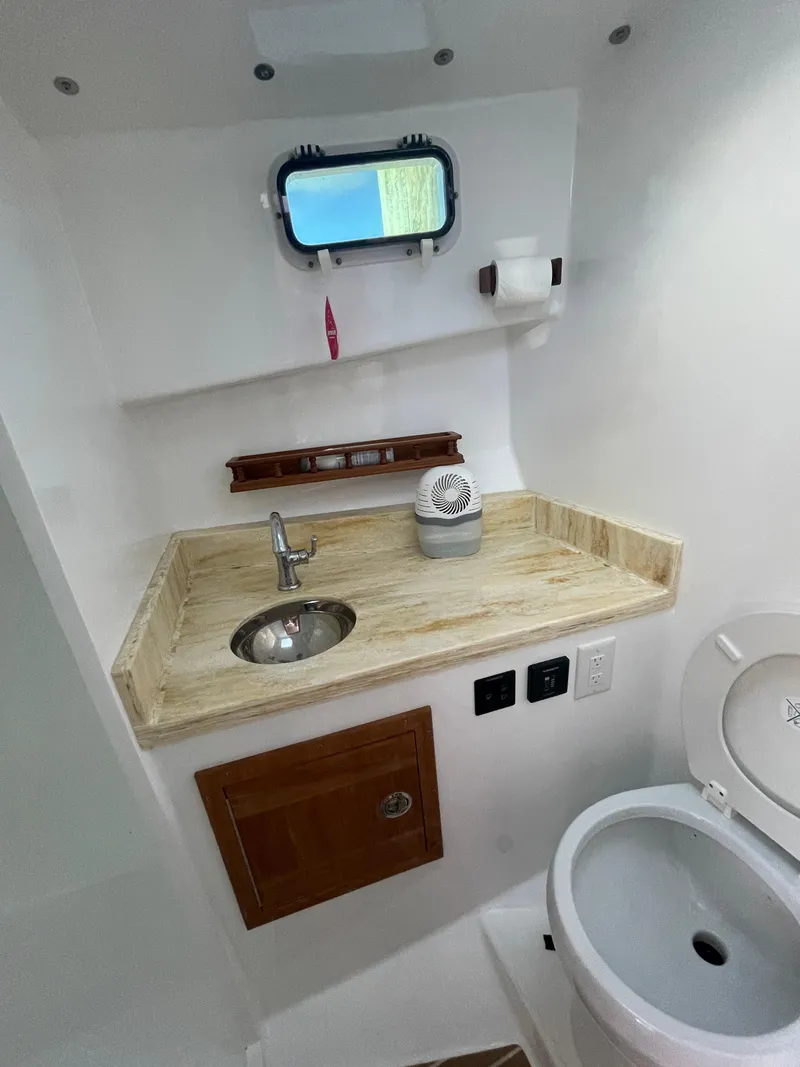 Slide: The Image of Spacious head with corian counter tops - 36