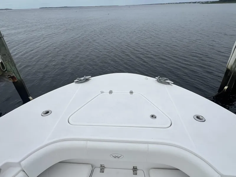 Slide: The Image of 2019 Southport 33 FE boat bow on calm water. - 4