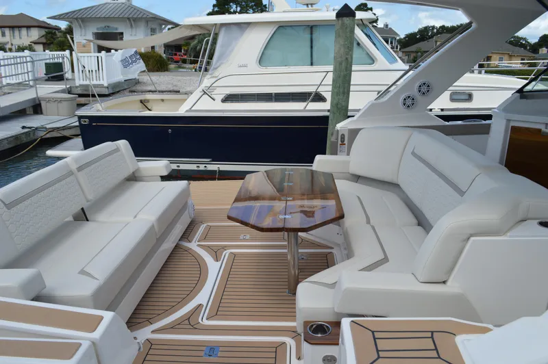 Slide: The Image of Tiara 48 LS - Aft Table and Seating - 35