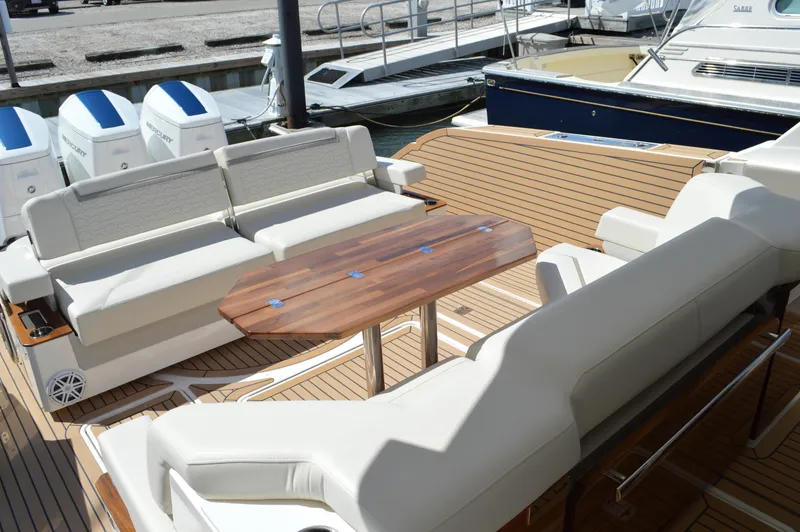 Slide: The Image of Tiara 48 LS - Aft Seating and Table - 38