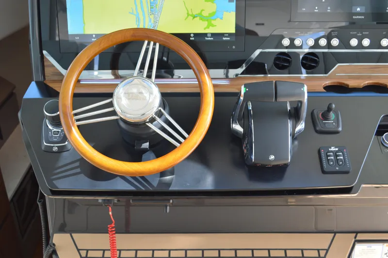 Slide: The Image of Tiara 48 LS - Wheel, Throttle, Bow Thruster and Trim Tab Controls - 47