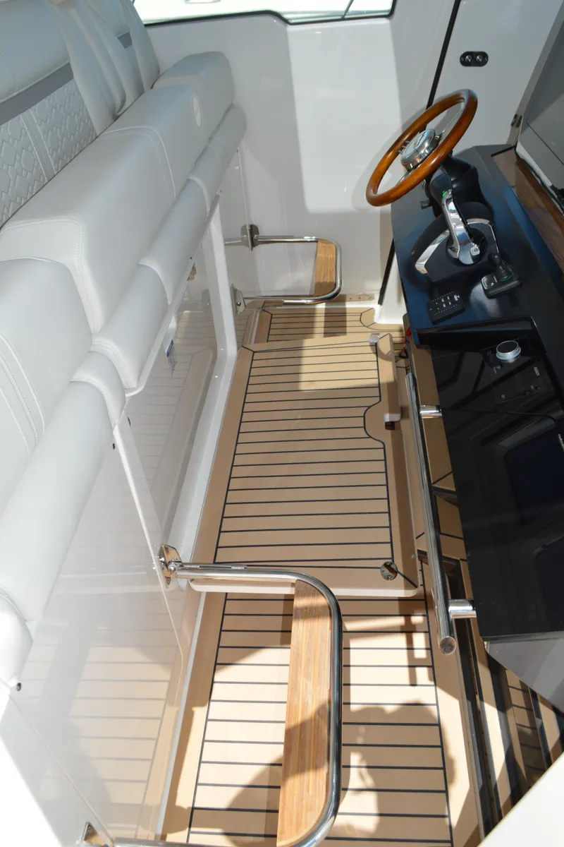 Slide: The Image of Tiara 48 LS - Helm Steps Down - 54