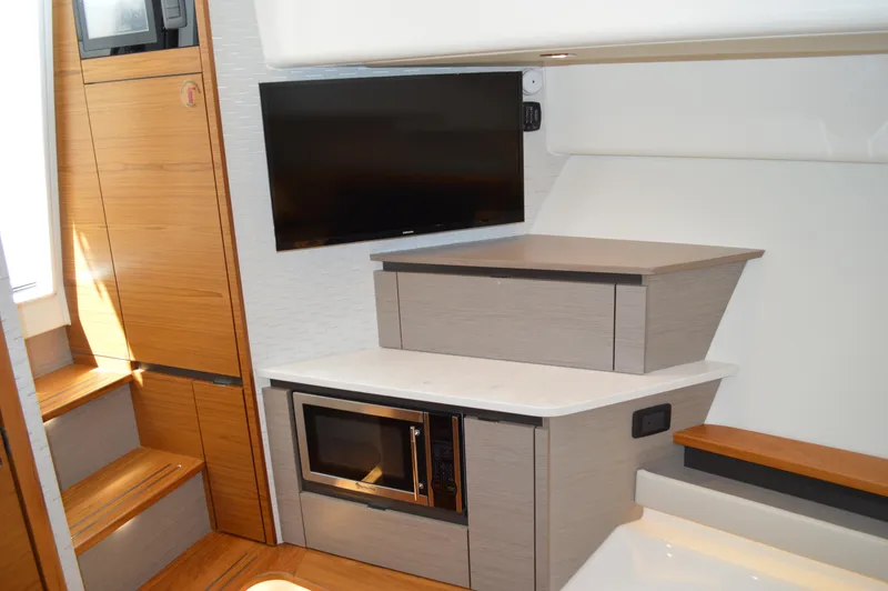 Slide: The Image of Tiara 48 LS - Forward Beth TV and Microwave - 60