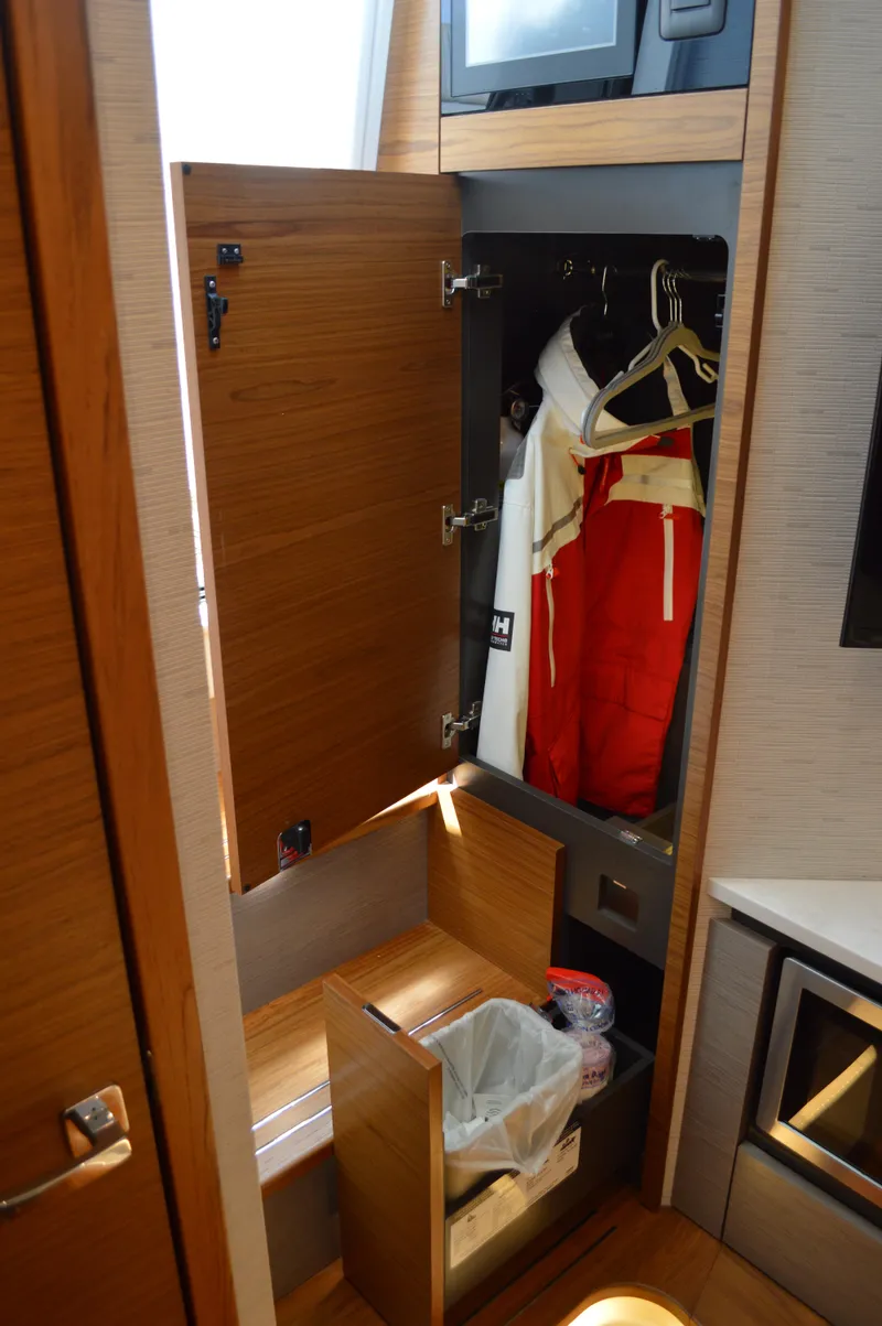 Slide: The Image of Tiara 48 LS - Forward Berth Storage and Trash - 61