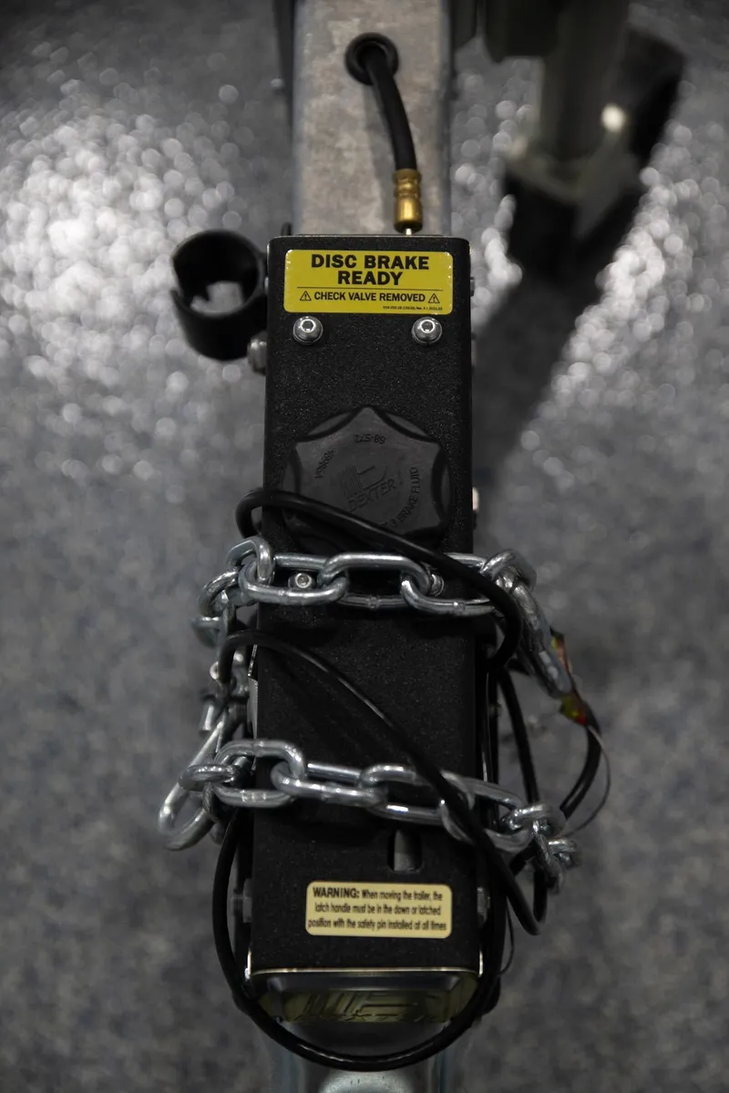 Slide: The Image of 2024 Contender 23 Bay trailer brake system with chain lock. - 8