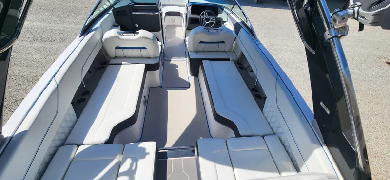 Slide: The Image of 2021 Regal LS6 Surf boat interior with spacious seating and modern design. - 6