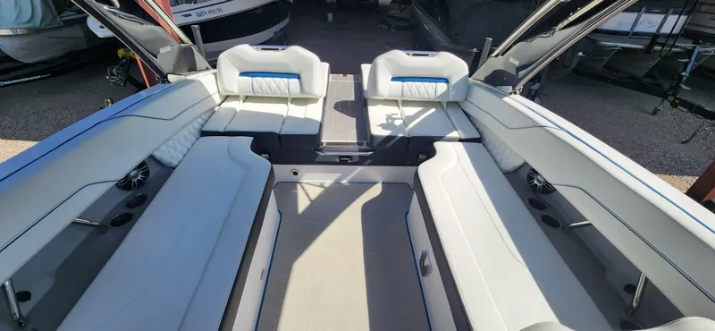 Slide: The Image of Interior of a 2021 Regal LS6 Surf boat with spacious seating. - 7