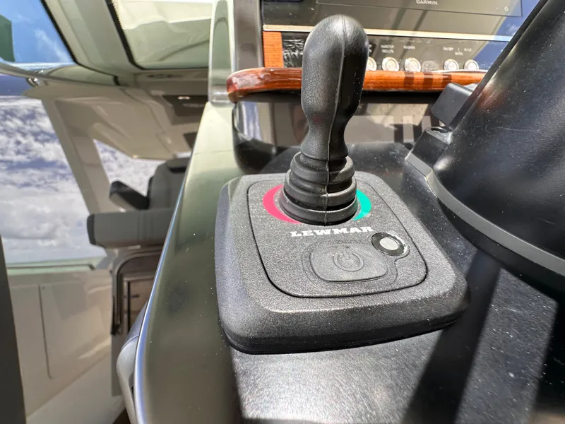 Slide: The Image of Close-up of 2021 Tiara Sport 34 LS boat joystick control. - 14