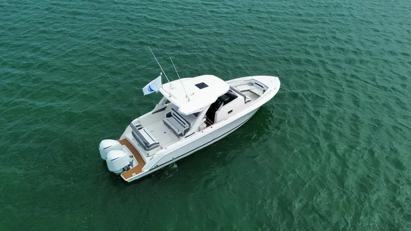 Slide: The Image of 2021 Tiara Sport 34 LS boat on open water, aerial view. - 6