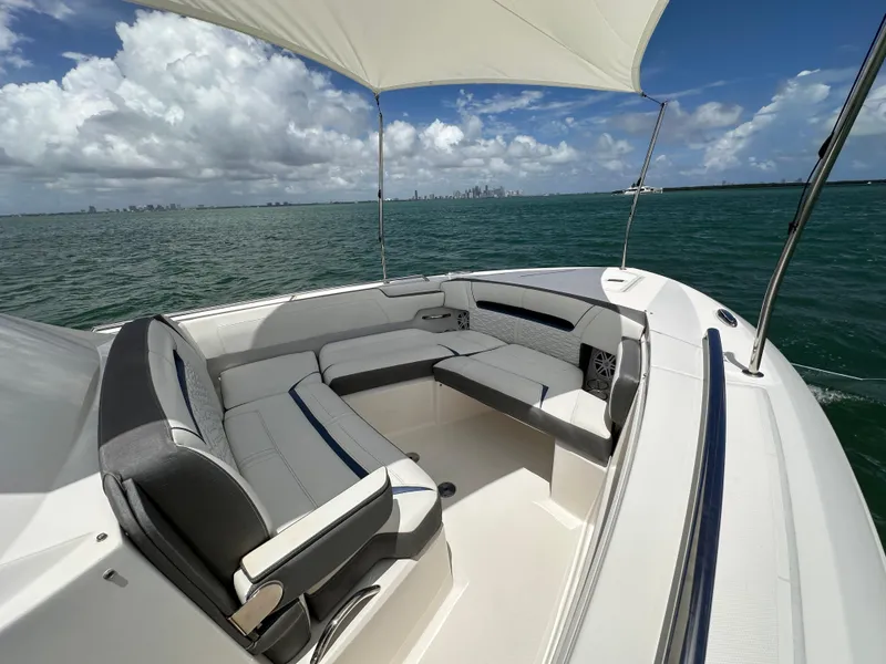 Slide: The Image of 2021 Tiara Sport 34 LS boat with spacious seating on open water. - 7