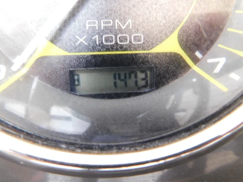 Slide: The Image of Close-up of a 2015 Sea Ray 19 SPX tachometer displaying 1473 RPM. - 17