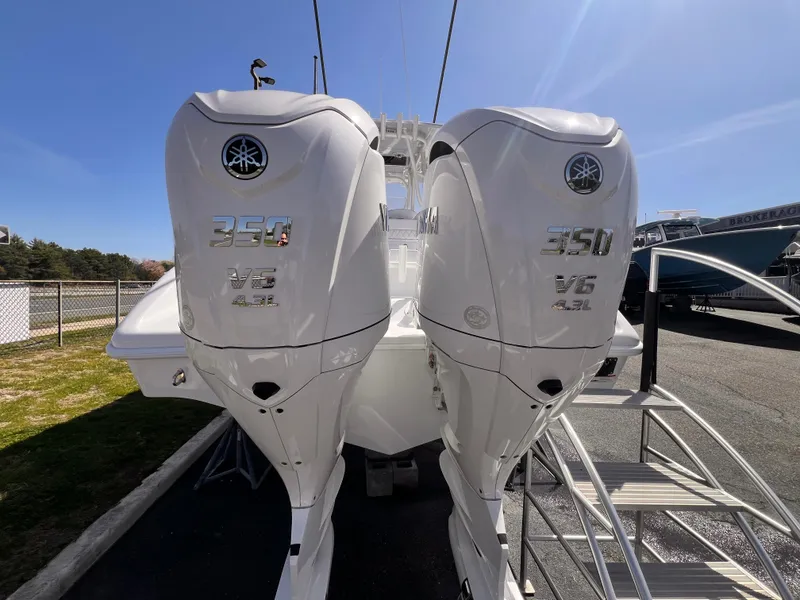 Slide: The Image of 2025 Yellowfin 32 boat with dual Yamaha 350 V8 outboard engines. - 3