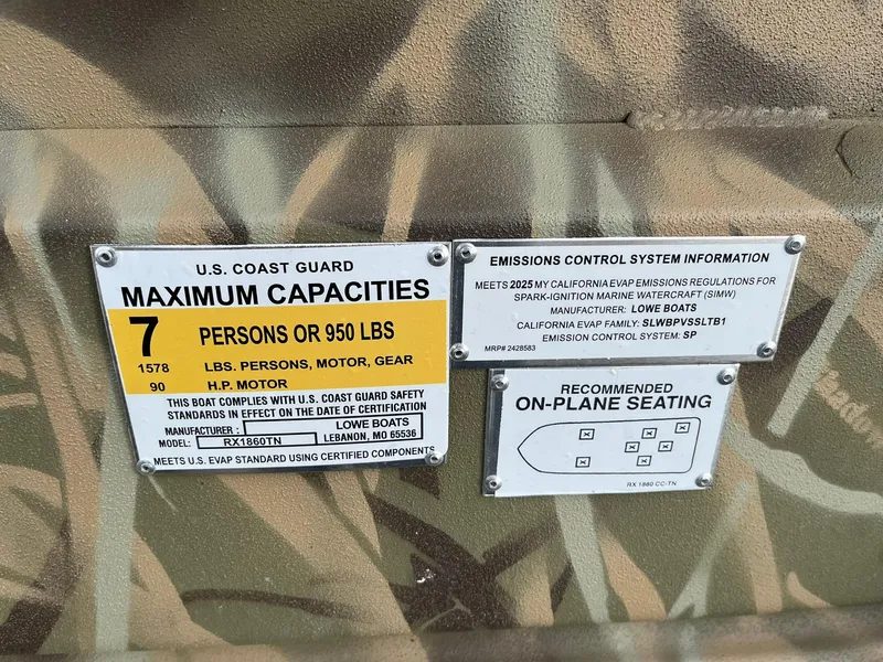 Slide: The Image of Capacity and emissions labels on 2025 Lowe Roughneck 1860 Tunnel Jet boat. - 24