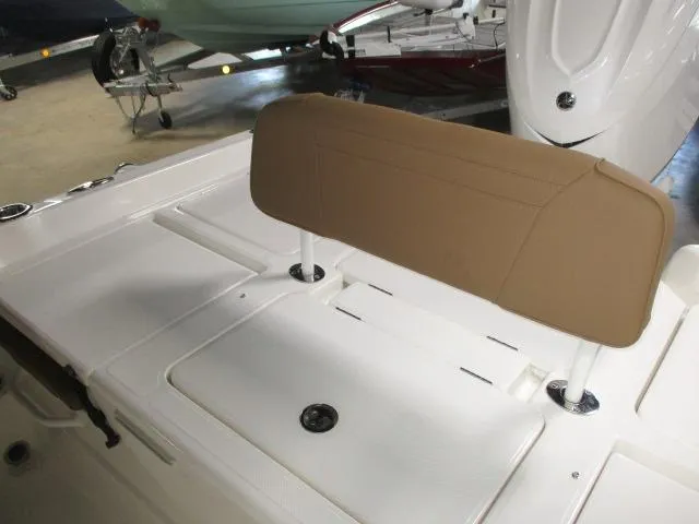 Slide: The Image of 2025 Skeeter SX2550 boat interior with tan seat and white deck. - 6