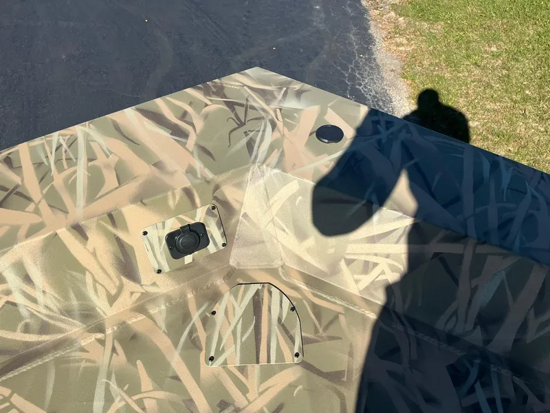 Slide: The Image of Camouflage pattern on 2025 Lowe Roughneck 2070 SC boat deck. - 19