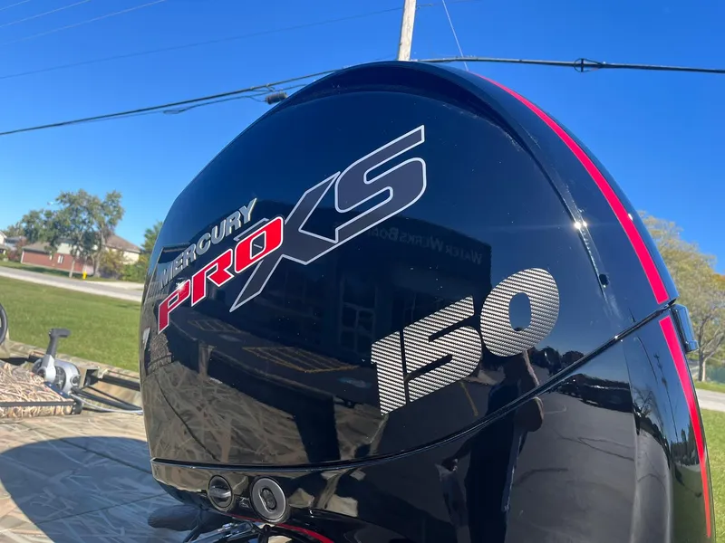 Slide: The Image of Mercury Pro XS 150 outboard motor on 2025 Lowe Roughneck 2070 SC boat. - 25