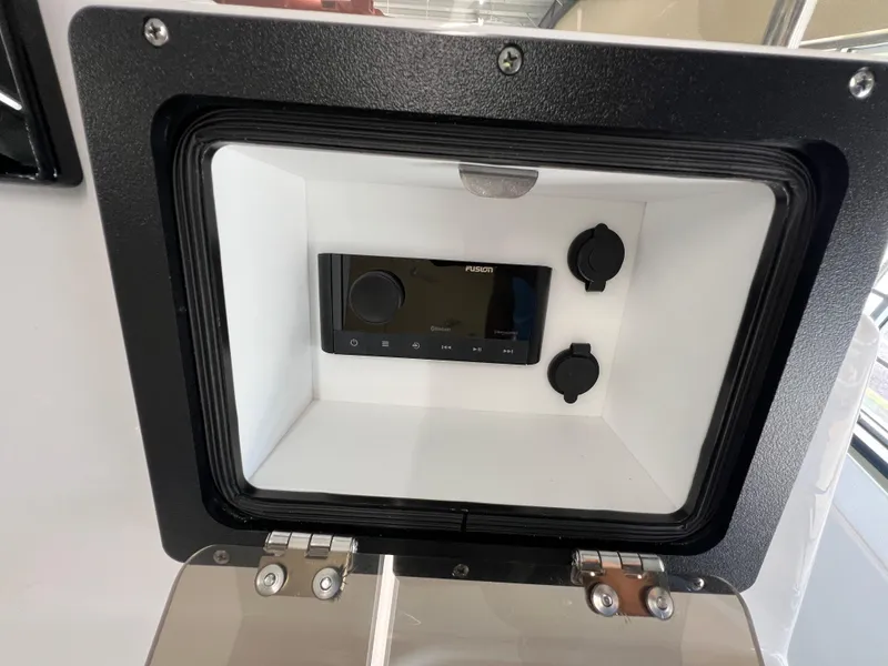 Slide: The Image of Control panel inside 2025 NauticStar 194 Bay boat compartment. - 18