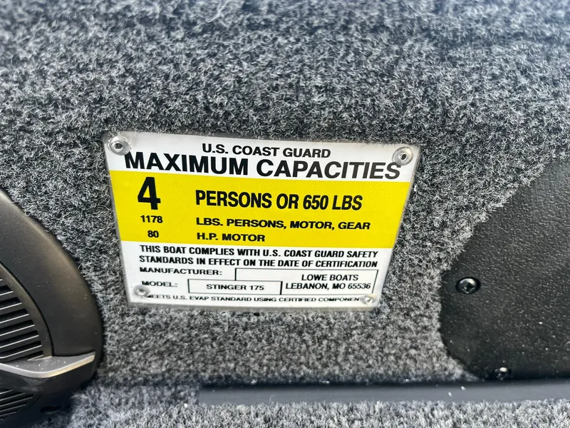 Slide: The Image of Capacity label on 2025 Lowe Stinger 175C boat, max 4 persons or 650 lbs. - 18