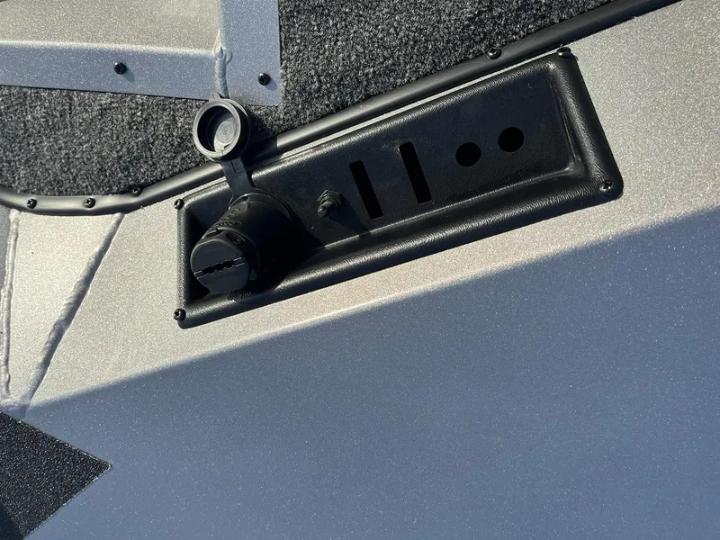 Slide: The Image of Close-up of 2025 Lowe Stinger 175C boat control panel. - 9