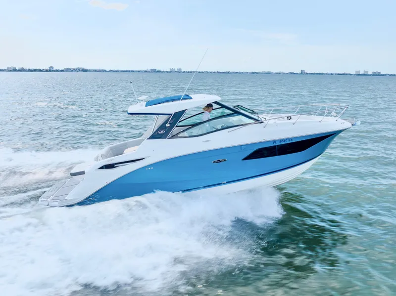 Slide: The Image of 2020 Sea Ray Sundancer 320 cruising on open water. - 4