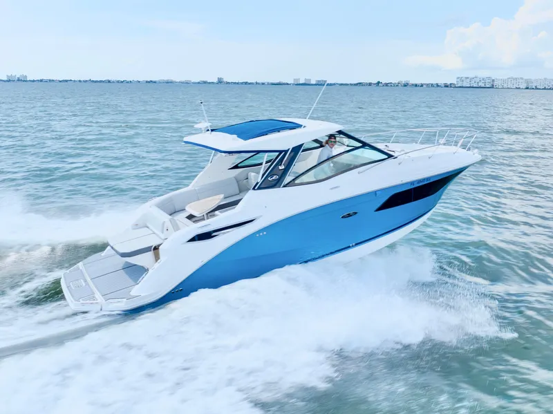 Slide: The Image of 2020 Sea Ray Sundancer 320 cruising on open water. - 5