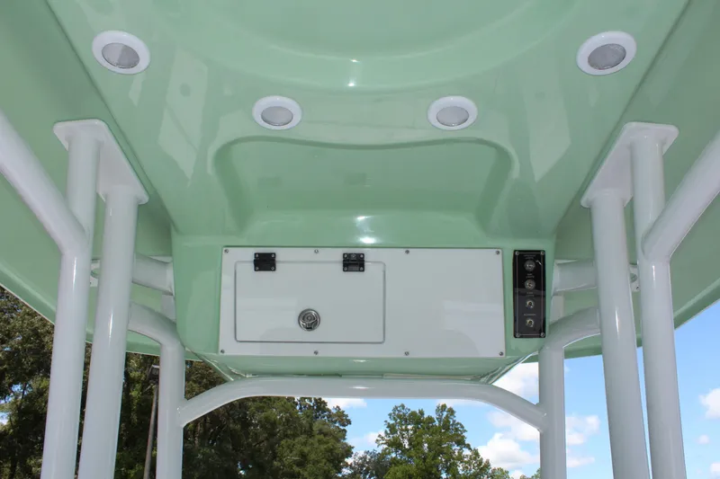 Slide: The Image of 2025 Sea Pro 230 Bay boat T-top with storage compartment and LED lights. - 23